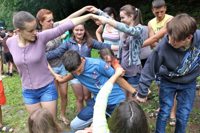 teens learn the job readiness skill of teamwork as they play the human knot game
